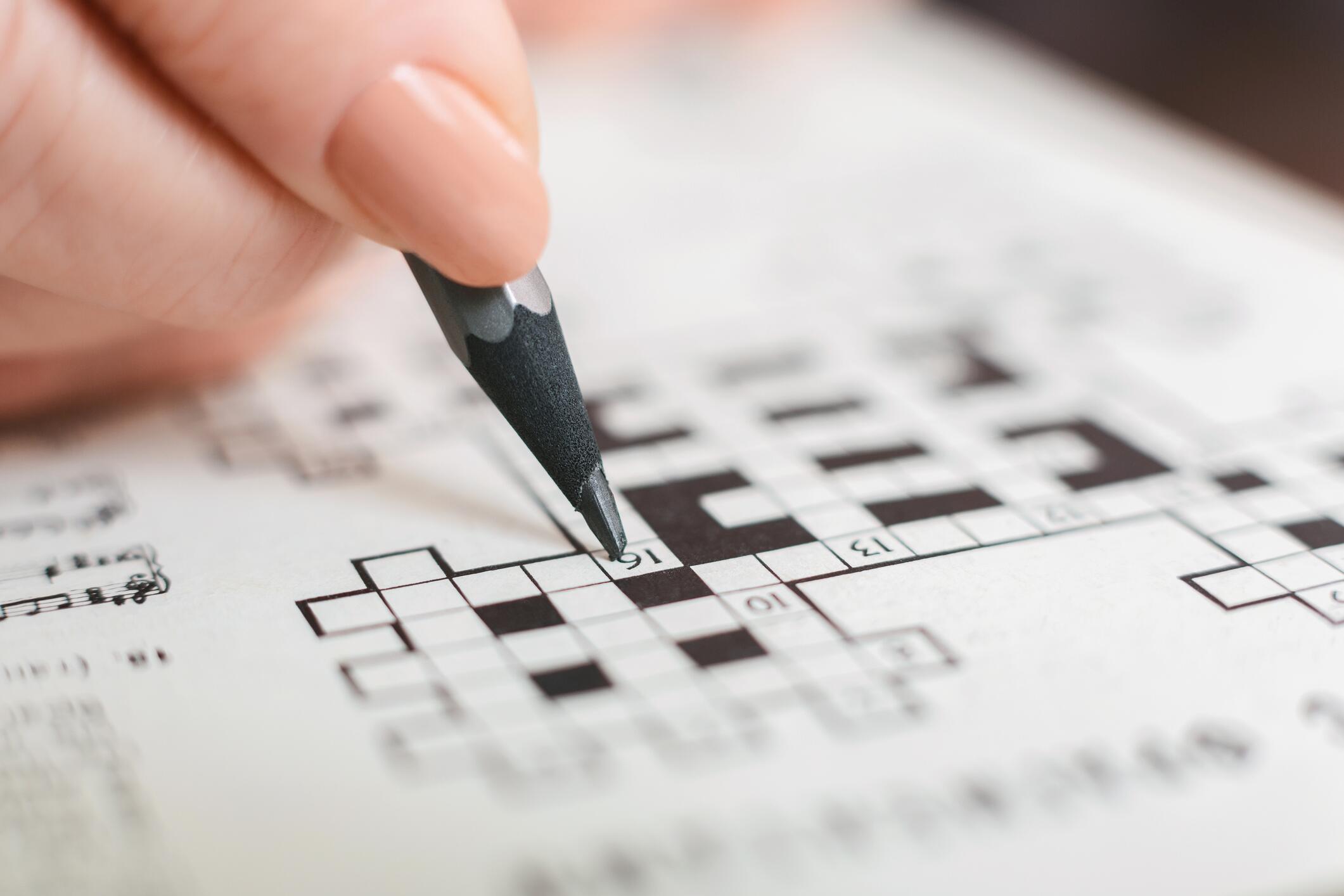 OG_ELDERLY_WOMAN_COMPLETING_THE_CROSSWORD_AT_HOME_ISTOCK_2023