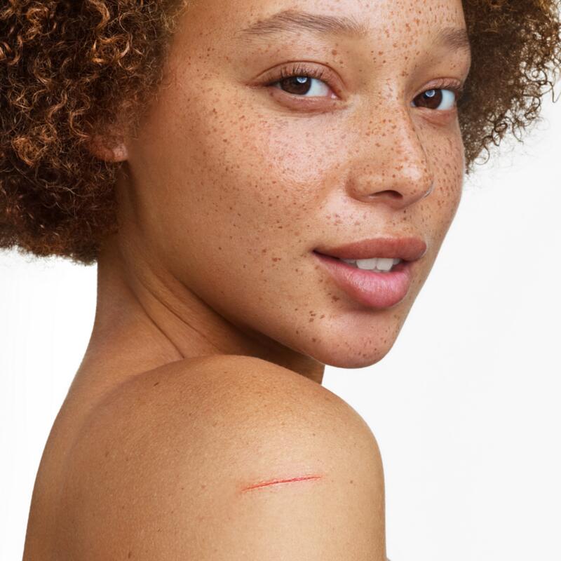 Crema reparadora antimarcas SPF50+