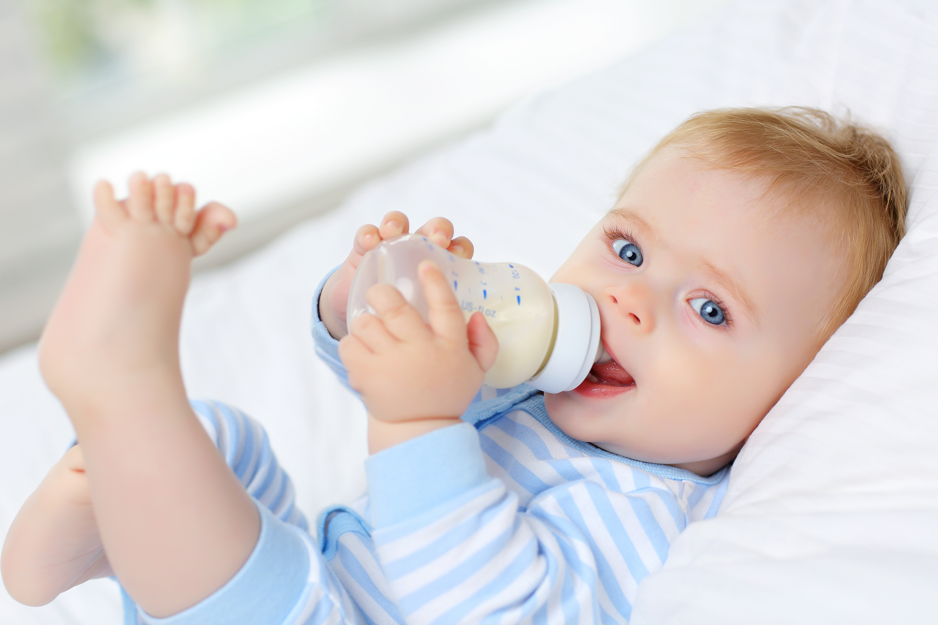 oc_baby_bottle_smile_shutterstock_1187290291