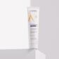 Crema reparadora antimarcas SPF50+