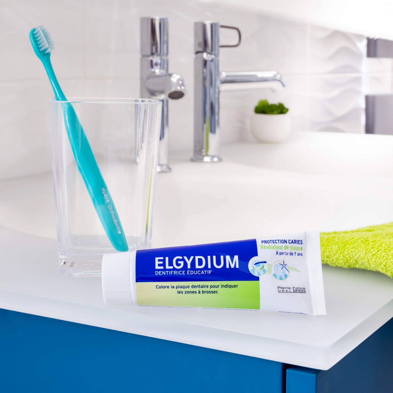 ELGYDIUM Паста за зъби Разкриваща плаката